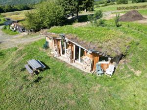 an aerial view of a small house on a hill at Le Pré Soutro in Arches