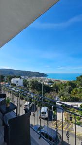 a balcony with a view of the ocean at Thai Boutique rooms in Peschici