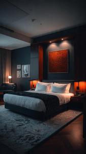 a bedroom with a large bed in a room at MOLELEKI in in Mthatha