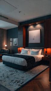 a bedroom with a large bed in a room at MOLELEKI in in Mthatha