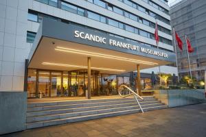 a building with a sign that reads senate framework institute at Scandic Frankfurt Museumsufer in Frankfurt +55 photos