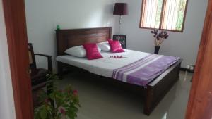 Кровать или кровати в номере Kavirose Holiday Home