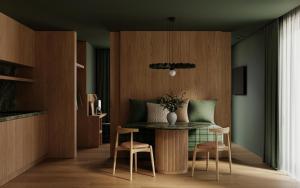 a dining room with a table and two chairs at Post Residence - Home of Memories - Dolomites in San Candido