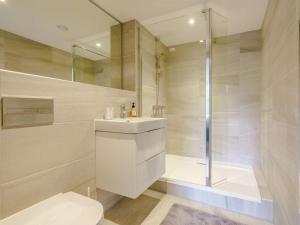 a bathroom with a toilet and a sink and a shower at 2 Bed in Keighley oc-83162 in Cononley +10 photos