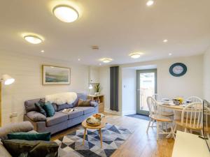 a living room with a couch and a table at 2 Bed in Scarborough oc-82543 in Snainton