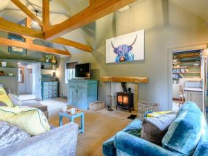 a living room with two couches and a fireplace at 4 Bed in Salisbury oc-82799 in Winchester