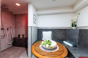 a cake sitting on a table in a bathroom at Day SPA Streudorf in Muhr amSee