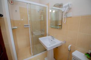 a bathroom with a shower and a sink at Ard Lui Residence in Nuwara Eliya +72 photos