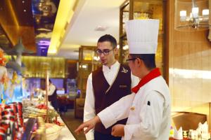 Μέλη του προσωπικού του Yinchuan Xifujing Hotel