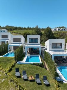 an aerial view of a house with a swimming pool at Villa Paradisio 2, Pool, Sea View in Hanioti