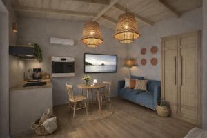 ein Wohnzimmer mit einem blauen Sofa und einem Tisch in der Unterkunft Katoi suite in Éxo Khóra