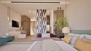 a bedroom with a bed and a living room at Pefkos Beach Studios & Apartments in Pefki