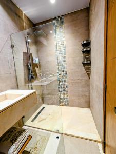 a bathroom with a shower and a sink at Beautiful Apartment overlooking Samaná Bay in Cayo Vigía +24 photos