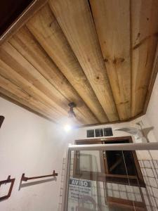 a room with a ceiling with wooden beams at La Vista Kite Preá in Prea +190 photos