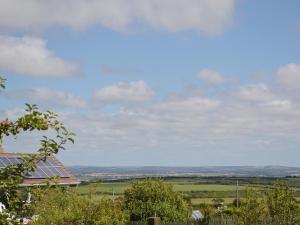 a view of a field from a house at Heather Brae Lodge in Nancledra
