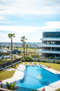 an image of a swimming pool at a resort at CasaBlanka Premium Apartment with Pool & Wellness in Torrevieja