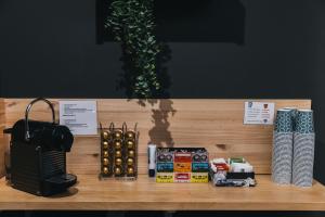 a table with a bunch of products on it at Pension Ondarra Autocheck-In in San Sebastián