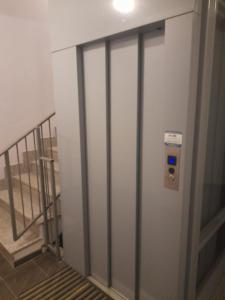 a glass door with a gate and a staircase at Casa Molines in Giaveno