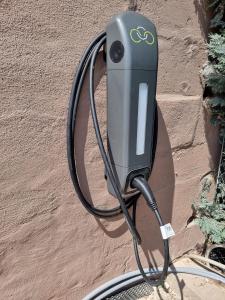 a solar charger hooked up to a wall at Appartement 1 mit Terrasse in Wehlenberg