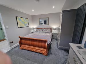 a bedroom with a bed in a room at The Nook in Rostrevor