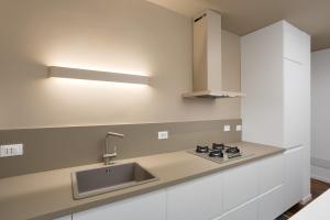 a kitchen with a sink and a counter top at La Casa sui Colli in Bologna