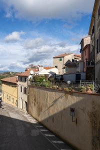 a view of a city with buildings and a street at La casina di Zora in Lorenzana