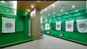 a room with a dressing room withttenham jerseys at We -Ciel de Mer in Busan