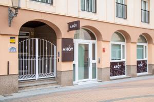 an entrance to a building with an akoya sign on it at Ahoy Plaza Mayor in Elda