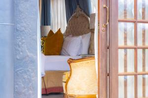 a bedroom with a bed with a canopy at Travel Shift Accommodation in Northam
