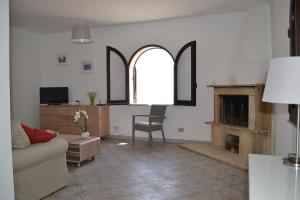 A television and/or entertainment centre at Charming Place Taormina Még 18 kép