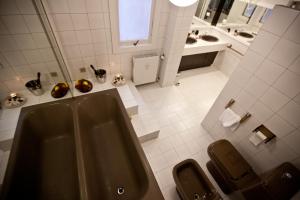 Koupelna v ubytování Heart of Rome Rooms