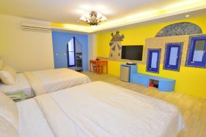 Postel nebo postele na pokoji v ubytování Sky Blue Ocean B&B