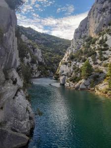 a river in a canyon with a mountain at Domaine d'Avalon in Lorgues