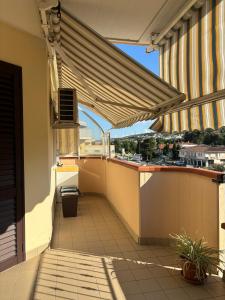 a balcony with a view of a city at Home 14 in Tortoreto Lido