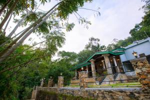 a house in the middle of a forest at Meadow Villa - Ella in Ella