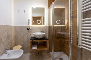 Kupatilo u objektu Hotel Ciampian +64 fotografije
