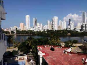 a view of a city with a river and buildings at Cartagena Sotavento Laguito in Cartagena de Indias +14 photos