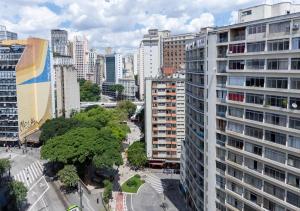 an aerial view of a city with tall buildings at Hotel Amalia by Plaza Xavier in São Paulo