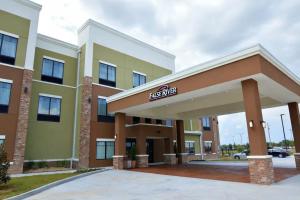 a rendering of a hotel with a parking garage at New Roads River Hotel in New Roads
