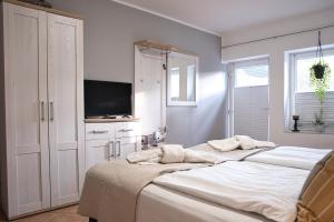 Gallery image of Doppelzimmer 3 Labskaus mit Küche by Pharus Appartements in Koserow