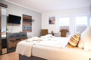 Gallery image of Doppelzimmer 5 Rollmops mit Küche by Pharus Appartements in Koserow