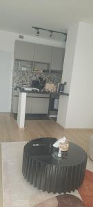 a black table in a room with a counter at Lace Luxe Homes in Tatu City