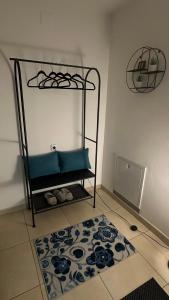 a room with a rug on the floor and a shelf at Apartman Staro Petrovo Selo in Staro Petrovo Selo