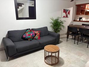 a living room with a couch and a table at House in Monterrey Nuevo León in Monterrey