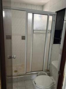 a bathroom with a shower with a toilet and a sink at House in Monterrey Nuevo León in Monterrey +18 photos