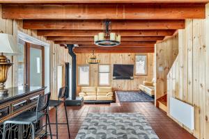 a living room with a couch and a table at Strathmere Country Retreat in Ottawa