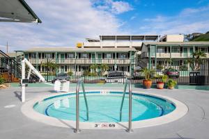 a swimming pool in front of a building at The Atwood Hotel San Diego - SeaWorld/Zoo in San Diego