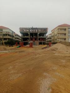 a building under construction with a dirt road in front at التطبيقيين راس البر in Ras El Bar
