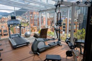 a gym with a view of a city at Hotel Cabrera Imperial By key 33 in Bogotá