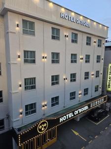 a hotel building with a sign that reads hotel california at Hotel Yoegieottae Gwangju Station in Gwangju